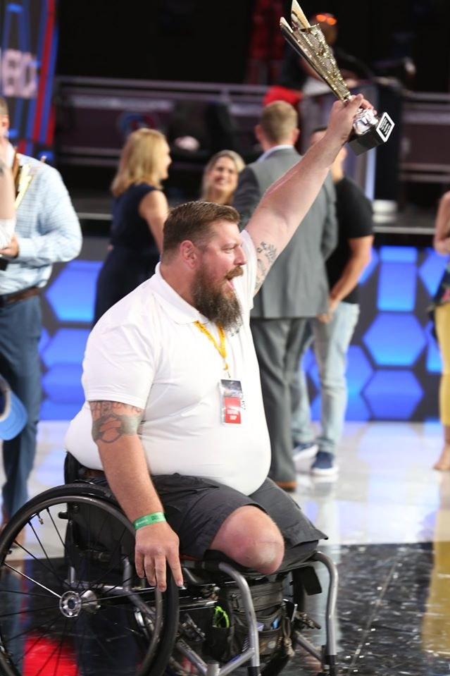 Jay Baker celebrating with an award